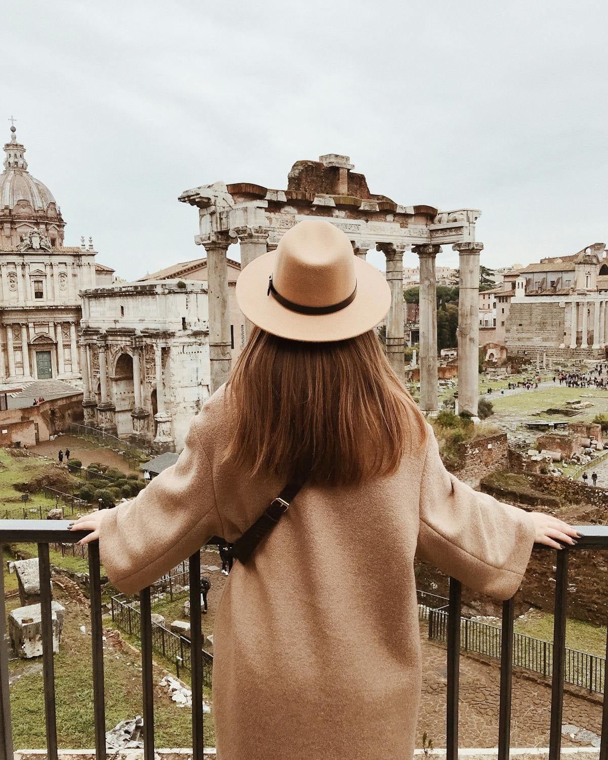 Tourist looking at Roman ruins